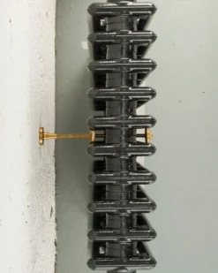 Väggfäste/Tippskydd för radiator - Mässing